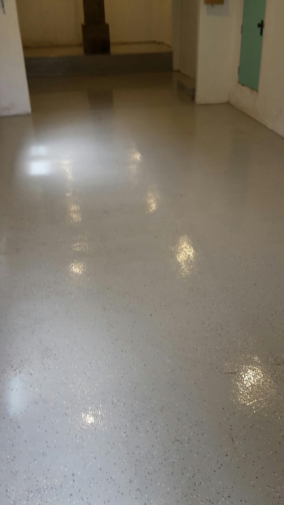 a white floor with a white wall and a white wall